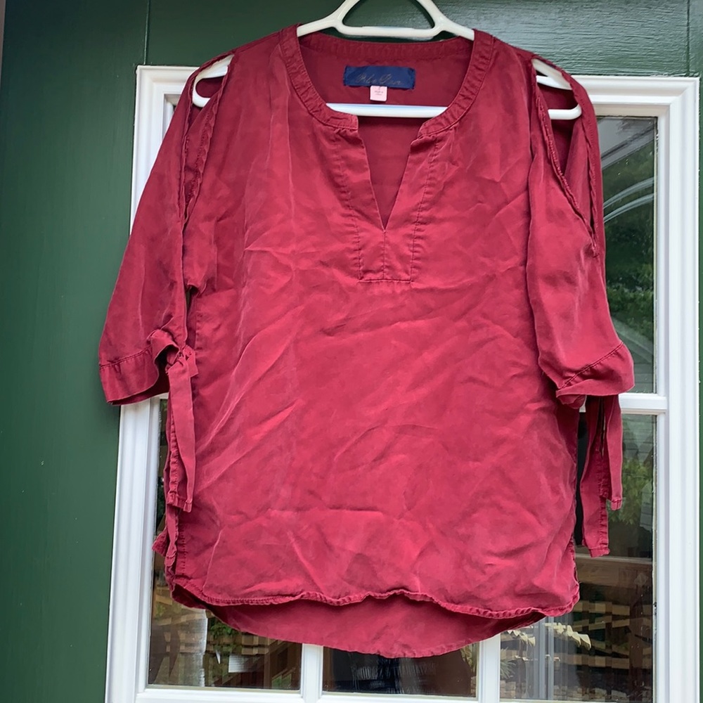 Women’s burgundy work shirt.